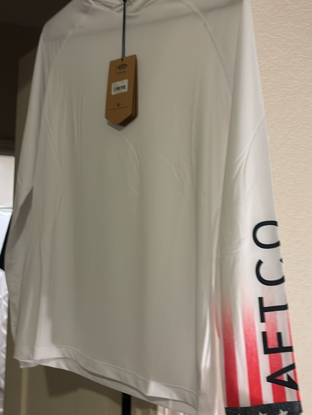 AFTCO White Long-Sleeve Performance Tee with American flag Sleeve